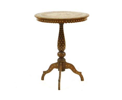 An Anglo Indian hardwood tripod table, Hoshiarpur, 19th century, ebony and ivory inlaid, 50.5cm diameter