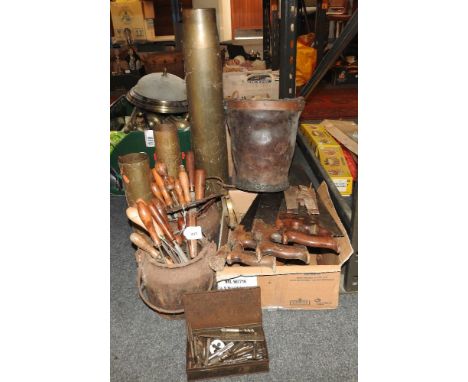 Three brass shell cases, saws, tools, fire bucket, glue pots, etcProvenance: The property of a gentleman dealer