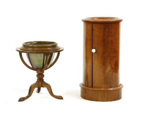 A Victorian circular mahogany bedside cabinet, with inset white marble top, 73cm high, and a mahogany tripod jardinière stand