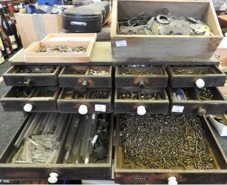 A small cabinet of drawers containing barometer spares, glass weights, knobs, hooks, catches, fixing plates, etcProvenance: T