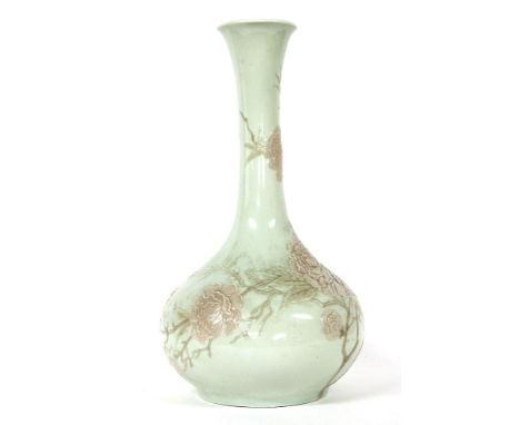 A large Lladro vase, decorated in relief with a flowering tree, 48cm high