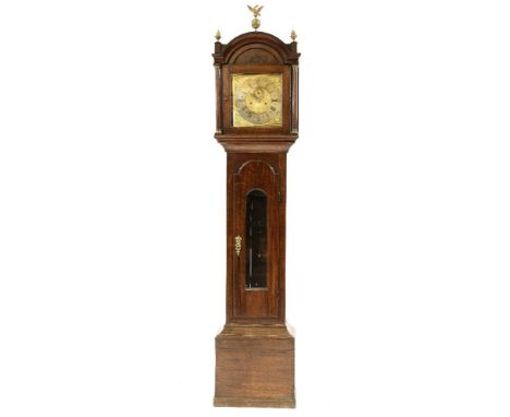 A George III oak longcase clock, by Thomas Page, Bishops Stortford having a brass arched dial with eight day movement, and gl