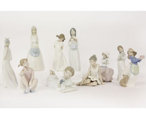 Nine Nao and other Spanish figures, one restored, 24.5cm