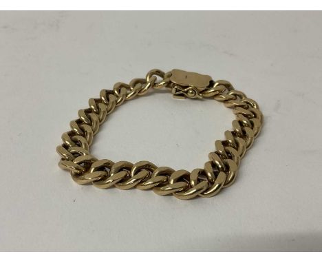 9ct yellow gold curb link bracelet38.3 grams
7.1cm internal diameter.8'' overall length.In good overall condition, with just 
