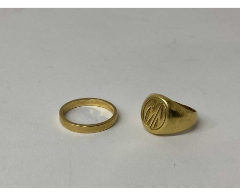18ct gold wedding ring, marked 750, ring size P and a yellow metal signet ring, ring size J (2) 12.6 grams total gross weight