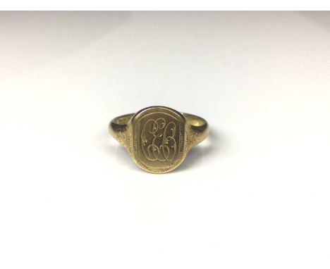 18ct gold signet ring with engraved initials (Birmingham 1930). Ring size WWeight 7.4 grams