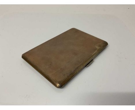 George VI silver cigarette case of rectangular form with engine turned decoration and gilded interior, stamped Dunhill, Londo