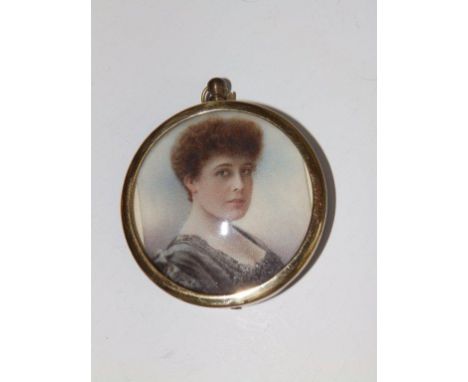 An Edwardian watercolour miniature – Portrait of a young woman – cut down to fit into later pendant frame 