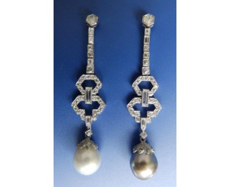 A pair of art deco style diamond set pearl drop earrings in platinum coloured metal – a white pearl to one, a grey pearl to t