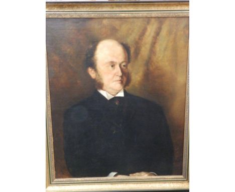 A late 19th/early 20thC oil portrait – Gentleman in black – re-lined 