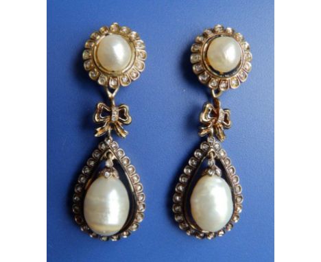 A pair of certified natural pearl and rose cut diamond gold drop earrings, comprising an oval cluster with central pearl appr