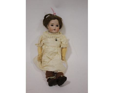 SIMON &amp; HALBIG FOR KAMMER &amp; REINHARDT DOLL the bisque head doll with weighted brown eyes, open mouth and pierced ears