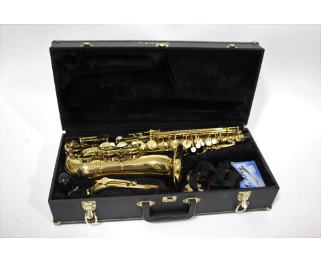 ALTO SAXOPHONE - BUFFET CRAMPON a Evette Buffet Crampon alto saxophone, with a mouthpiece and accessories and in a fitted cas