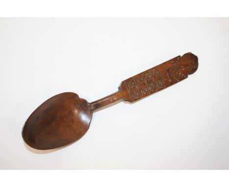 19THC WELSH TREEN LOVE SPOON - 1822 the fruitwood spoon with the initials E R and the date 1822, the handle incised with flow