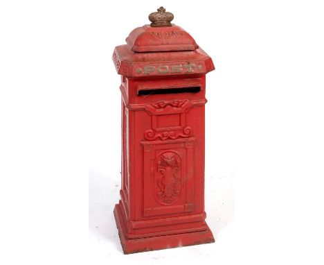 CAST IRON POST BOX a red painted cast iron pillar post box mounted with a crown to the top, marked Post on the front and with