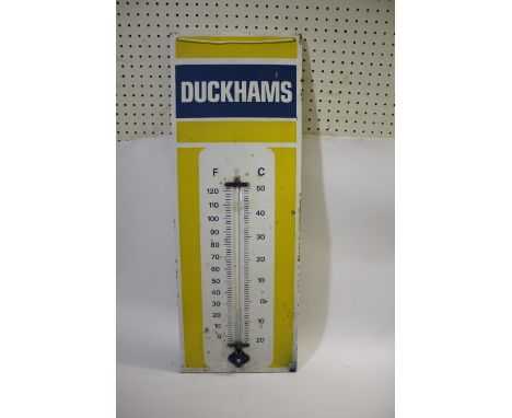 DUCKHAMS ENAMEL SIGN a large enamel sign with attached thermometer (thermometer damaged), with measurements in Celsius and Fa