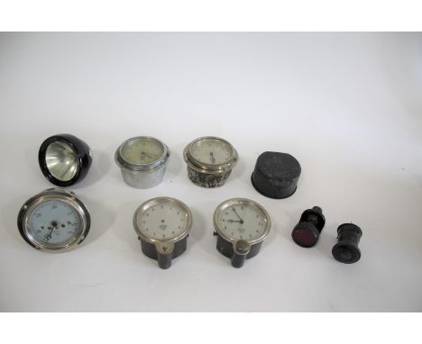 SMITHS VINTAGE MOTORING CAR CLOCK with a silver colour dial and aperture for mileage (A-532.119), with a chrome mount with va