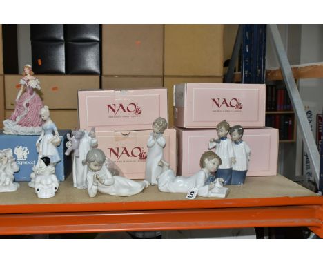 A GROUP OF ORNAMENTAL FIGURINES FROM NAMED MANUFACTURERS comprising a Wedgwood Spink limited Edition Coronation Ball (No. 511