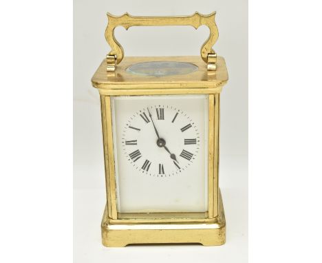 A FIRST HALF 20TH CENTURY BRASS CARRIAGE CLOCK, five bevel edge panel glazed case, enamel dial, Roman numerals, height to top