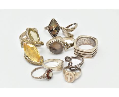 A BAG OF WHITE METAL RINGS, to include a silver cluster ring, hallmarked Birmingham, a heavy silver square ring, hallmarked E
