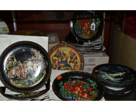 A GROUP OF RUSSIAN THEMED COLLECTORS PLATES, comprising seventeen Vinogradoff Porcelain 'Russian Legends plates of which two 