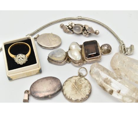 A BAG OF JEWELLERY AND TWO CRYSTALS, to include two quartz crystals, a white metal cats eye cabochon set brooch, stamped 925,