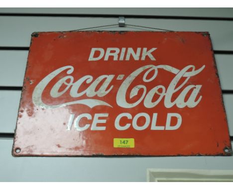 A genuine early 20th century Coca Cola Drink Ice Cold enamel advertising sign
