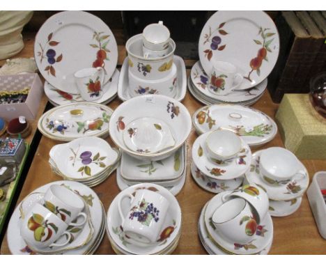 An extensive selection of Royal Worcester 'Evesham' pattern tea and dinner wares, to include cups and saucers, bowls.