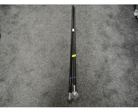 Two vintage walking canes one with crystal glass handle and similar with metal handle