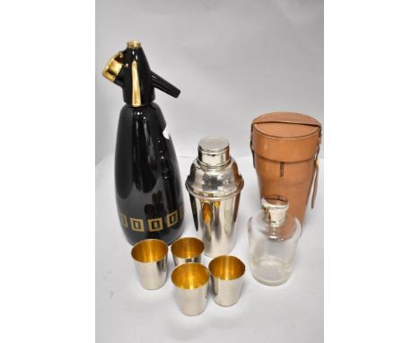 A portable cocktail mixer and shot set with a vintage soda syphon