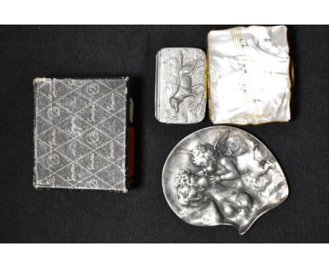 A Cornish pewter snuff box with a hound design, a Stratton musical compact case and a pewter dish with cherub design