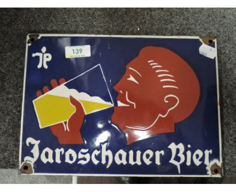 An early 20th century Jaroschauer Bier enamel advertising sign