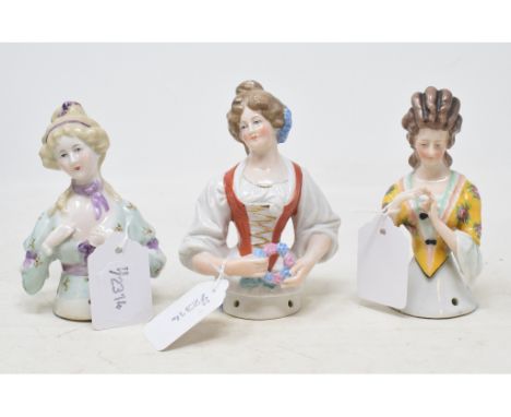 A Goebel porcelain half doll, Elizabeth of Austria, lady with ring, 12 cm high, and two others (3) 