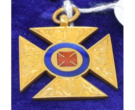 A 9ct gold and enamel medallion, inscribed, approx. 9.2 g 