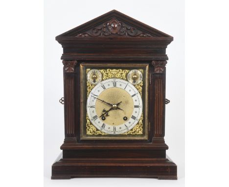 A late 19th century mantel clock, the 16 cm square brass dial signed Jameson, Dublin, with a silvered chapter ring and with C
