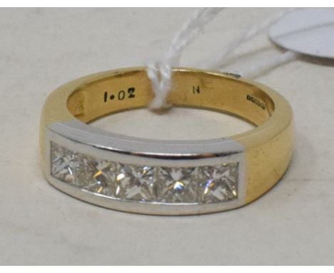 An 18ct yellow gold ring, set five princess cut diamonds in a channel setting, approx. 1.02ct, approx. ring size N 