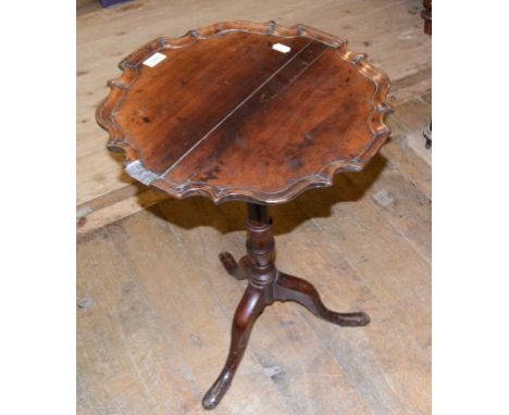 A 19th century mahogany tripod table, with a piecrust top, some loss, 46 cm wide 