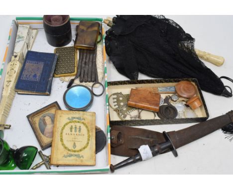 A silver coloured metal and enamel box, some damage, a fan, parasol, and other items, damages 