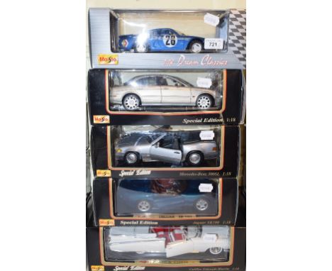 A Maisto Dream Classics 1:18 die-cast model Renault Alpine, and four others, all boxed (5)Report by GHThe condition suggests 