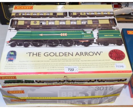 A Hornby 00 gauge train pack, The Golden Arrow, R 2369, and two others, Coronation Scot, R 2371M and Silver Jubilee, R 2445, 