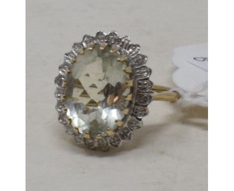 A 9ct gold, green amethyst and diamond ring 