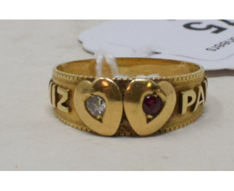 An 18ct gold, diamond chip and garnet MIZPAH ring, approx. 3.6 g (all in)Approx. P½All letters are clear.Tiny nibbles to both