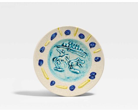 Picasso, Pablo1881 Malaga - 1973 MouginsPicador. 1953. White earthenware clay, partly polychromed and glazed. Ø 22.5 x 2.5cm.