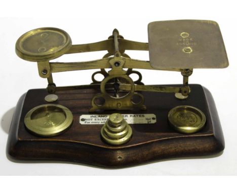 Set of wooden based and brass letter scales with weights, 18cm wide 