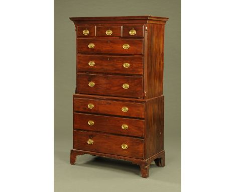 A George III mahogany tallboy, with moulded cornice above three short and three long drawers to the upper section, the base f