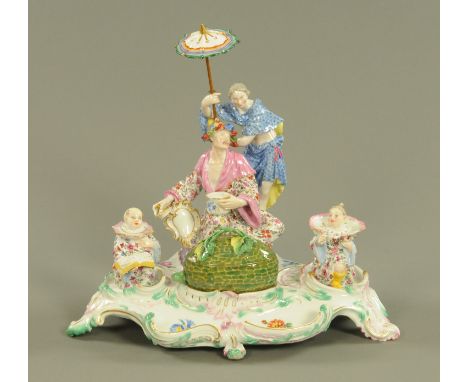 A Dresden 19th century porcelain inkwell stand, of large form, each separate piece with Dresden mark.  Height to top of paras