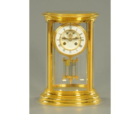 A gilded brass four glass clock, of oval form, the enamel dial with Brocot escapement and with eight day movement chiming on 