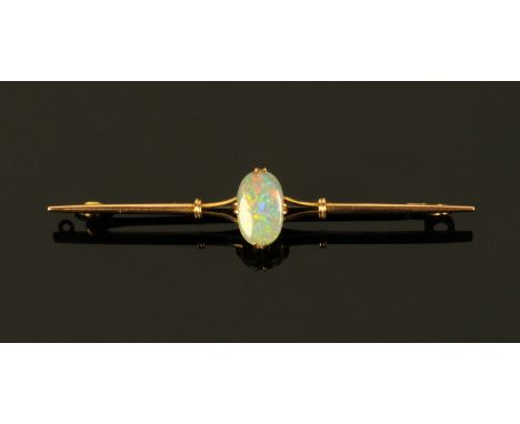 A 9 ct gold opal brooch.