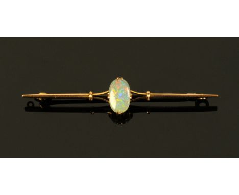 A 9 ct gold opal brooch.