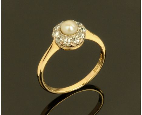 A 9 ct gold pearl and diamond set ring, size O.